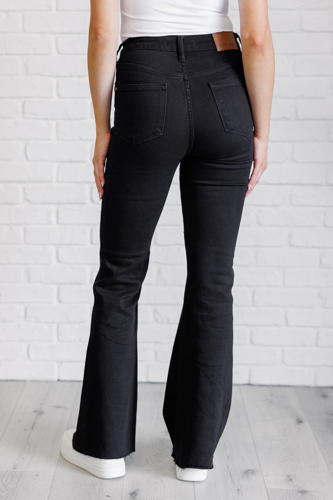 Etta High Rise Control Top Flare Jeans in Black